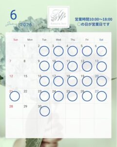June 2026 calendar for Kanacru Hair with blue rings marking many days as booked; business hours shown in Japanese.